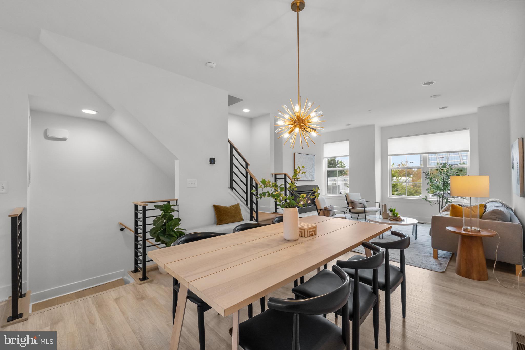 1891 Midline Avenue Reston, VA 20190 - Photo 18 of 53 a view of a dining room with furniture and wooden floor