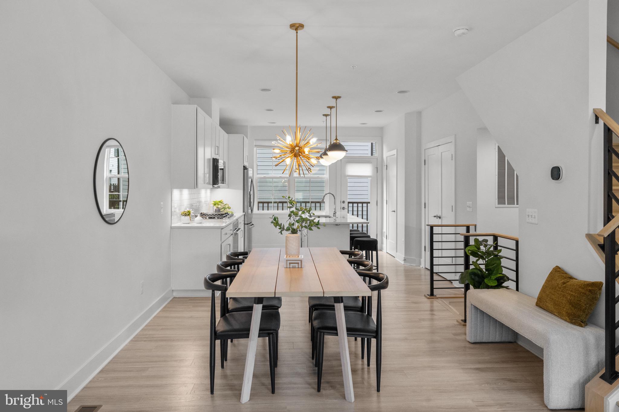 1891 Midline Avenue Reston, VA 20190 - Photo 19 of 53 a view of a dining room with furniture window and wooden floor