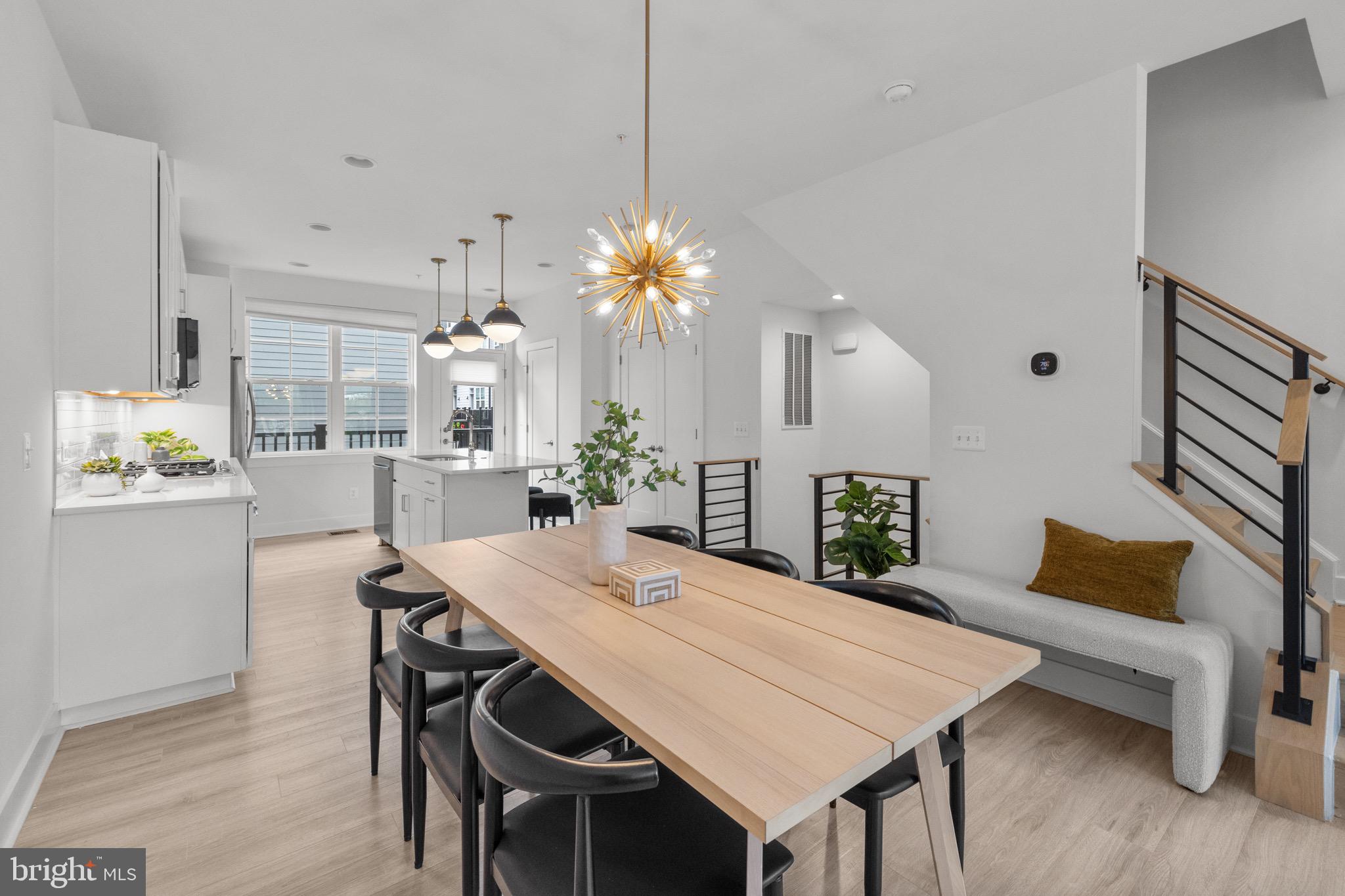 1891 Midline Avenue Reston, VA 20190 - Photo 20 of 53 a view of a dining room with furniture and wooden floor