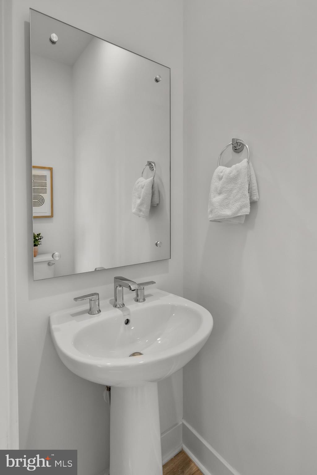 1891 Midline Avenue Reston, VA 20190 - Photo 25 of 53 a bathroom with a sink and a mirror