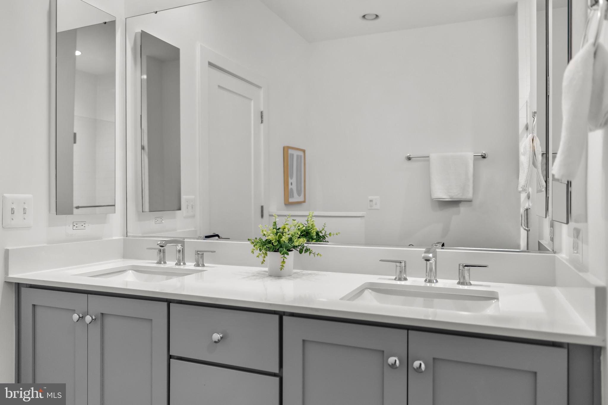 1891 Midline Avenue Reston, VA 20190 - Photo 31 of 53 a bathroom with a sink and a mirror