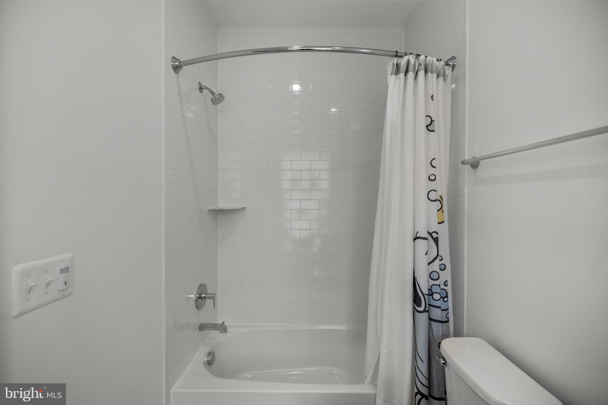 1891 Midline Avenue Reston, VA 20190 - Photo 35 of 53 a bathroom with a shower and a toilet