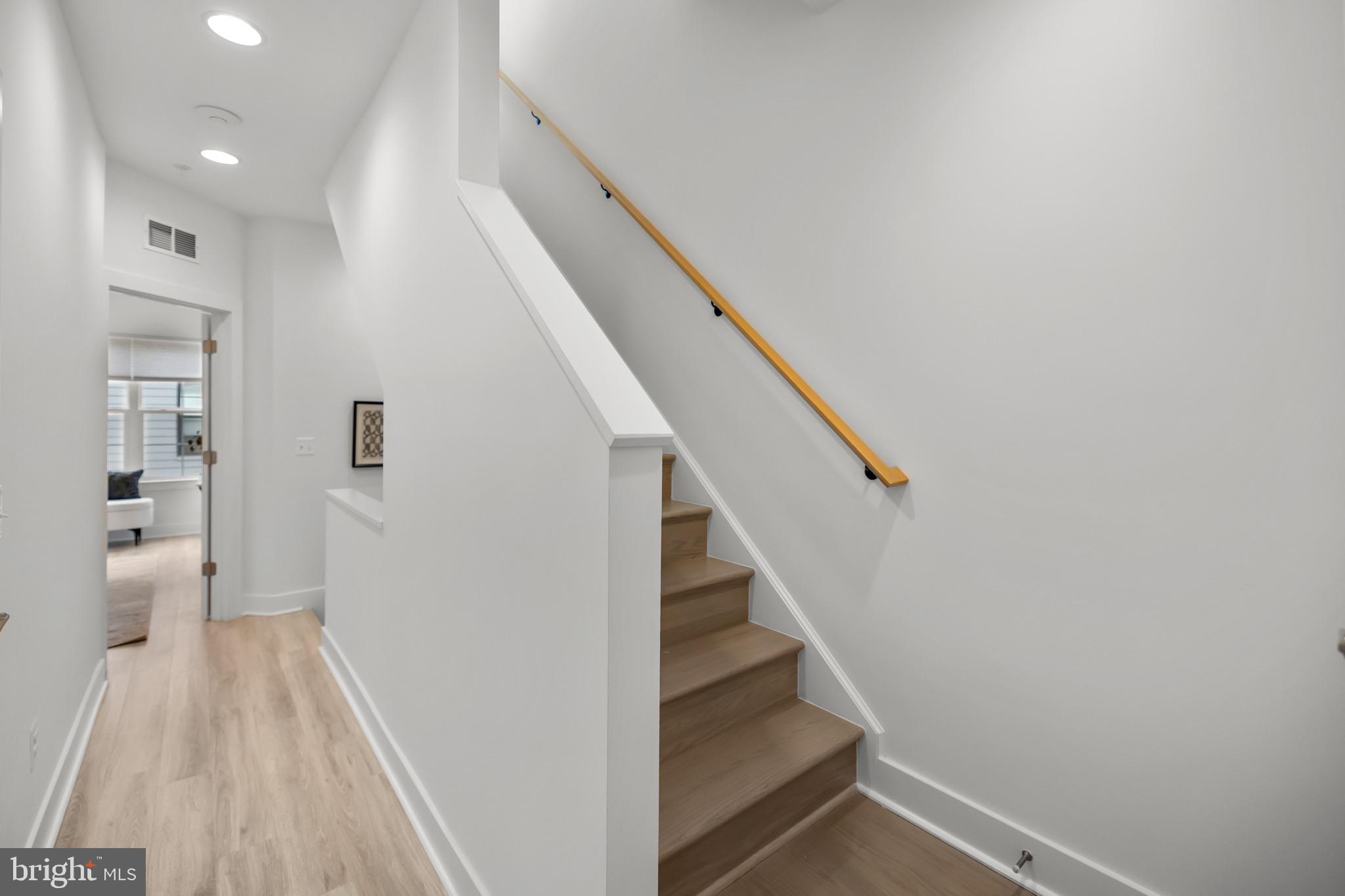 1891 Midline Avenue Reston, VA 20190 - Photo 36 of 53 a view of entryway with wooden floor