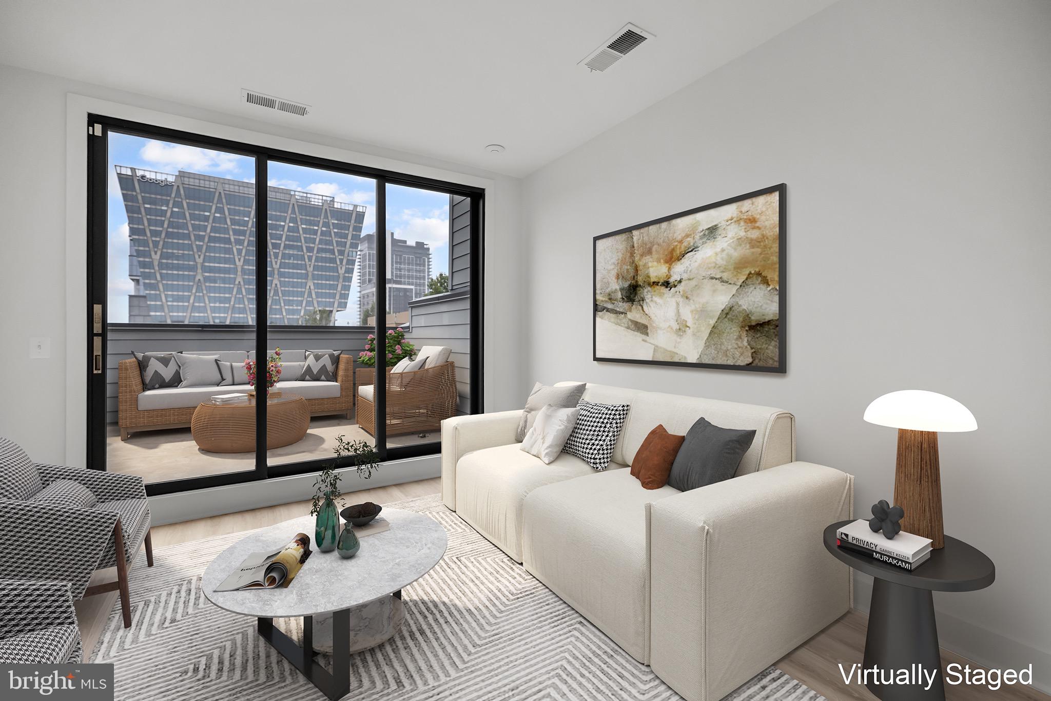1891 Midline Avenue Reston, VA 20190 - Photo 37 of 53 a living room with furniture and a large window