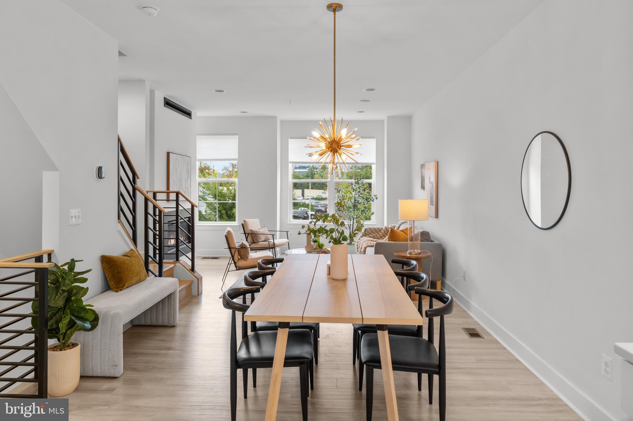 1891 Midline Avenue Reston, VA 20190 - Photo 4 of 53 a view of a dining room with furniture window and outside view