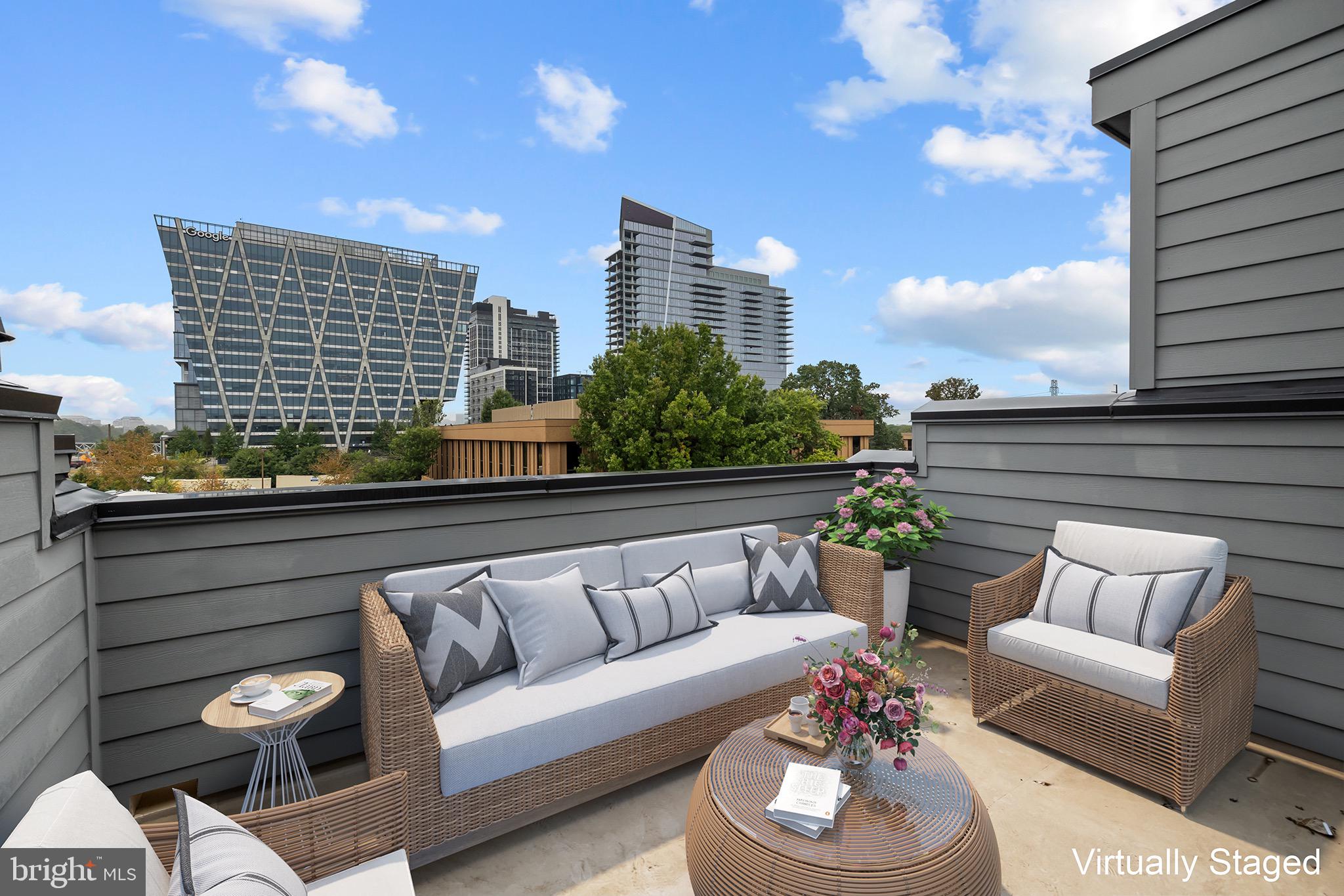 1891 Midline Avenue Reston, VA 20190 - Photo 45 of 53 a roof deck with couch and a potted plant