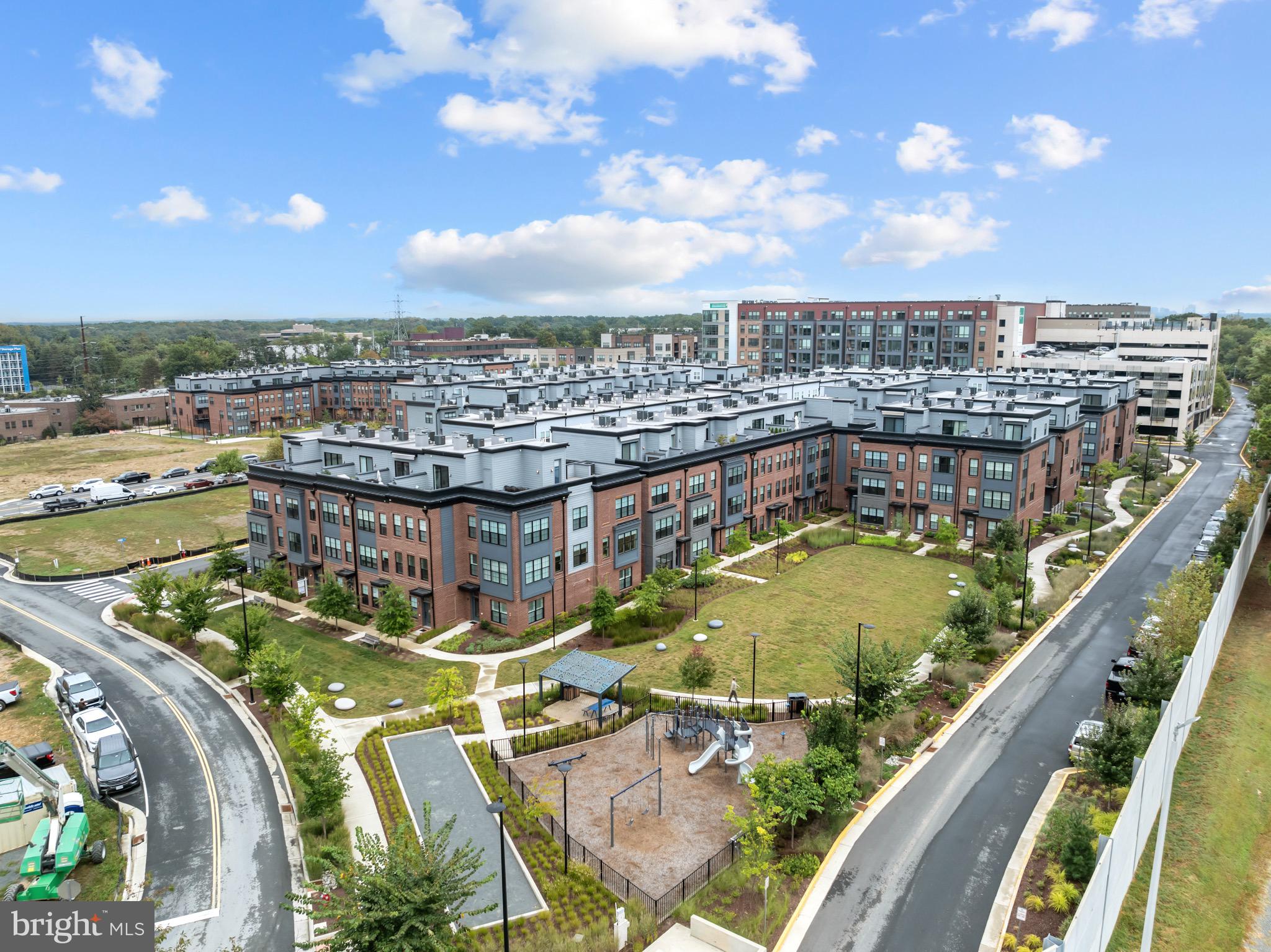 1891 Midline Avenue Reston, VA 20190 - Photo 49 of 53 a view of a swimming pool with a patio and a yard