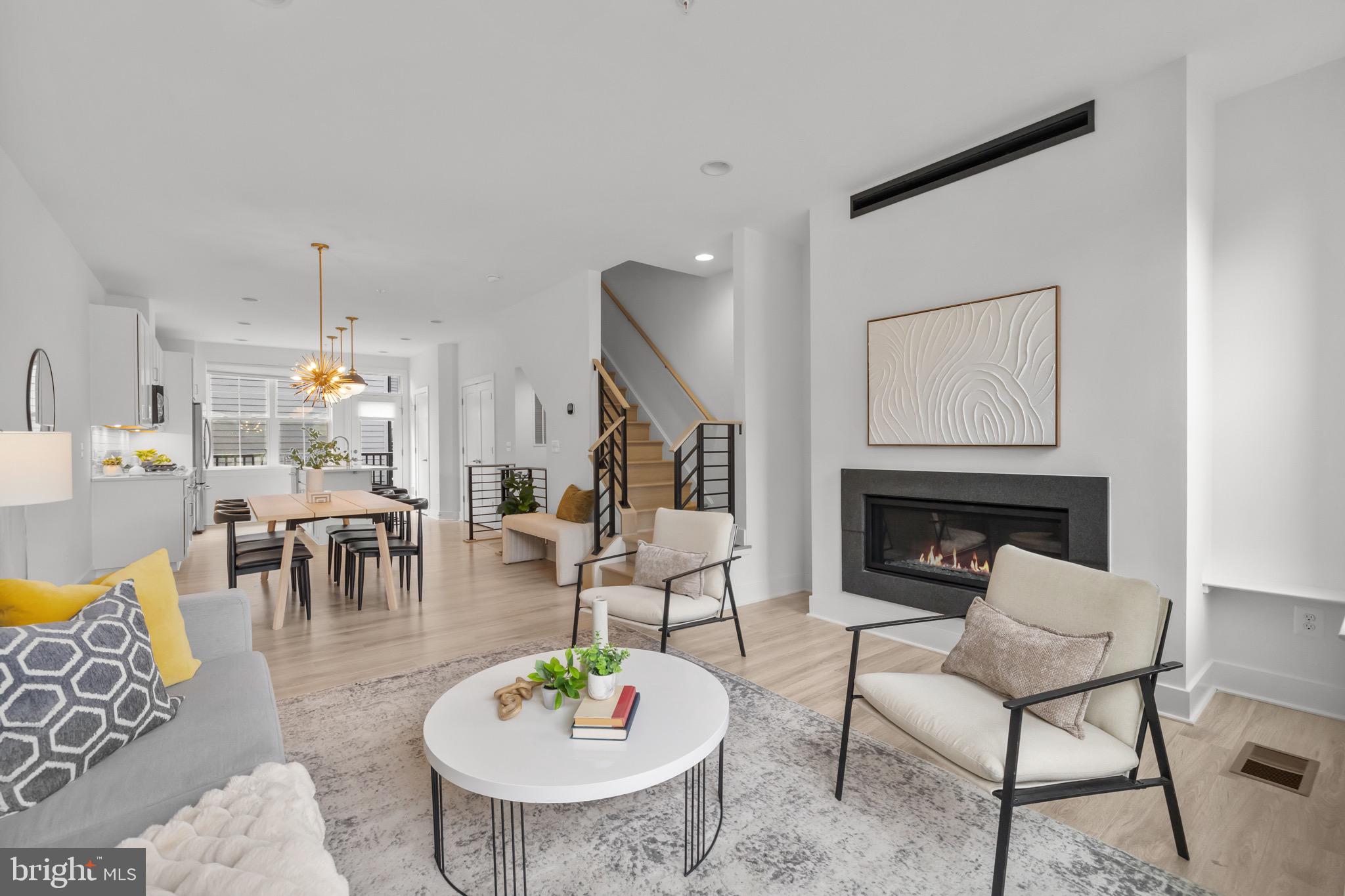 1891 Midline Avenue Reston, VA 20190 - Photo 5 of 53 a living room with furniture and a table