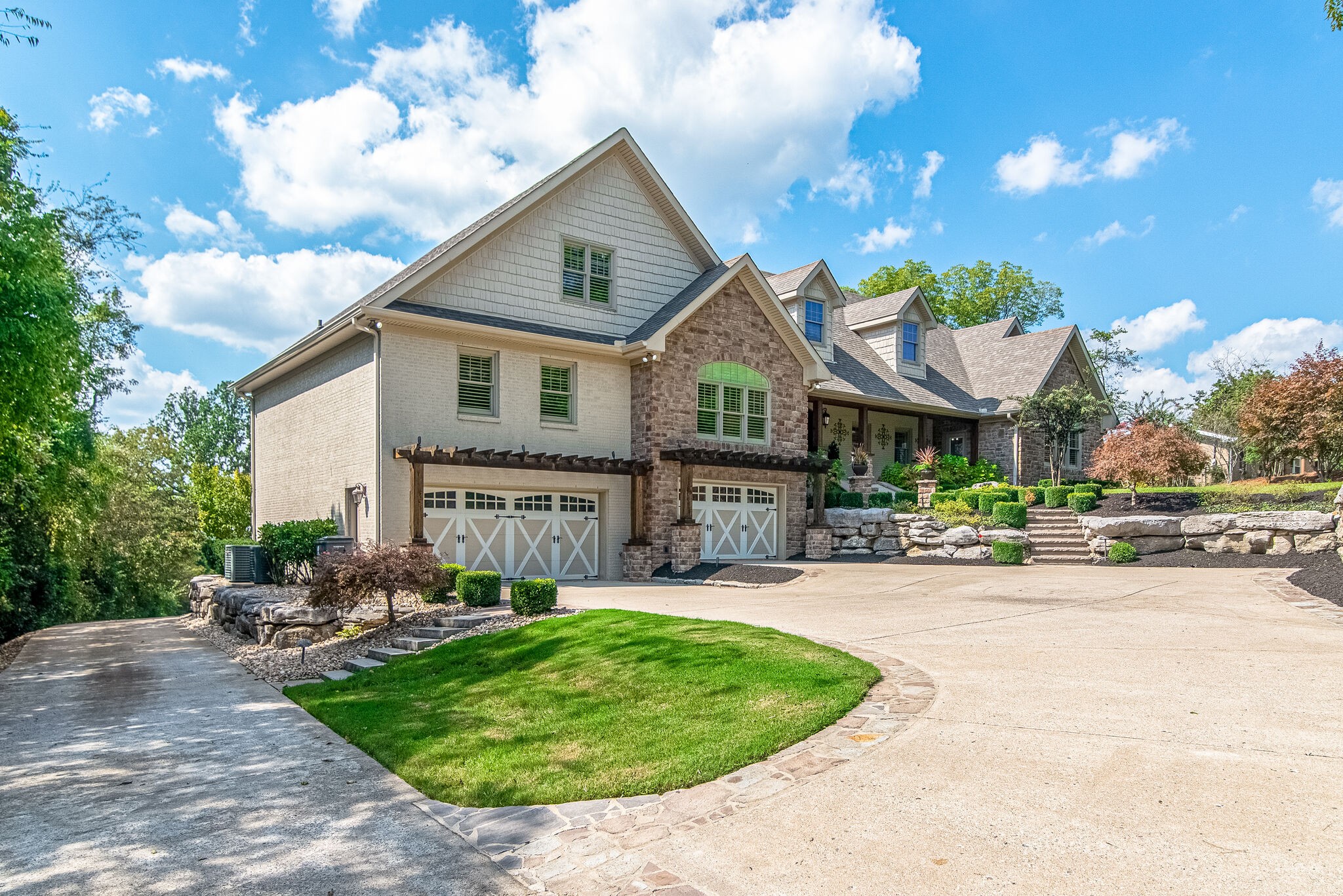 297 Vanderbilt Road Mount Juliet, TN 37122 - Photo 2 of 50 a front view of a house with yard and green space