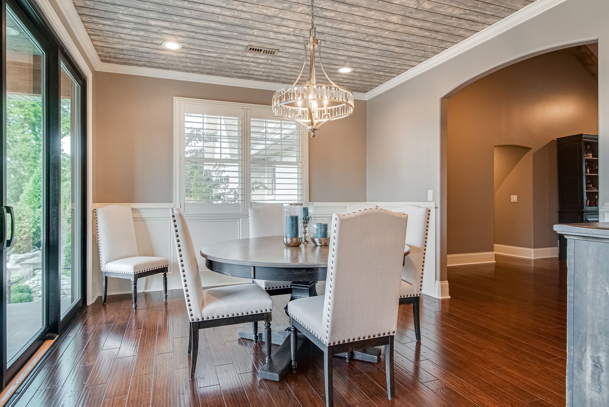 297 Vanderbilt Road Mount Juliet, TN 37122 - Photo 16 of 50 a view of a dining room with furniture wooden floor and a chandelier