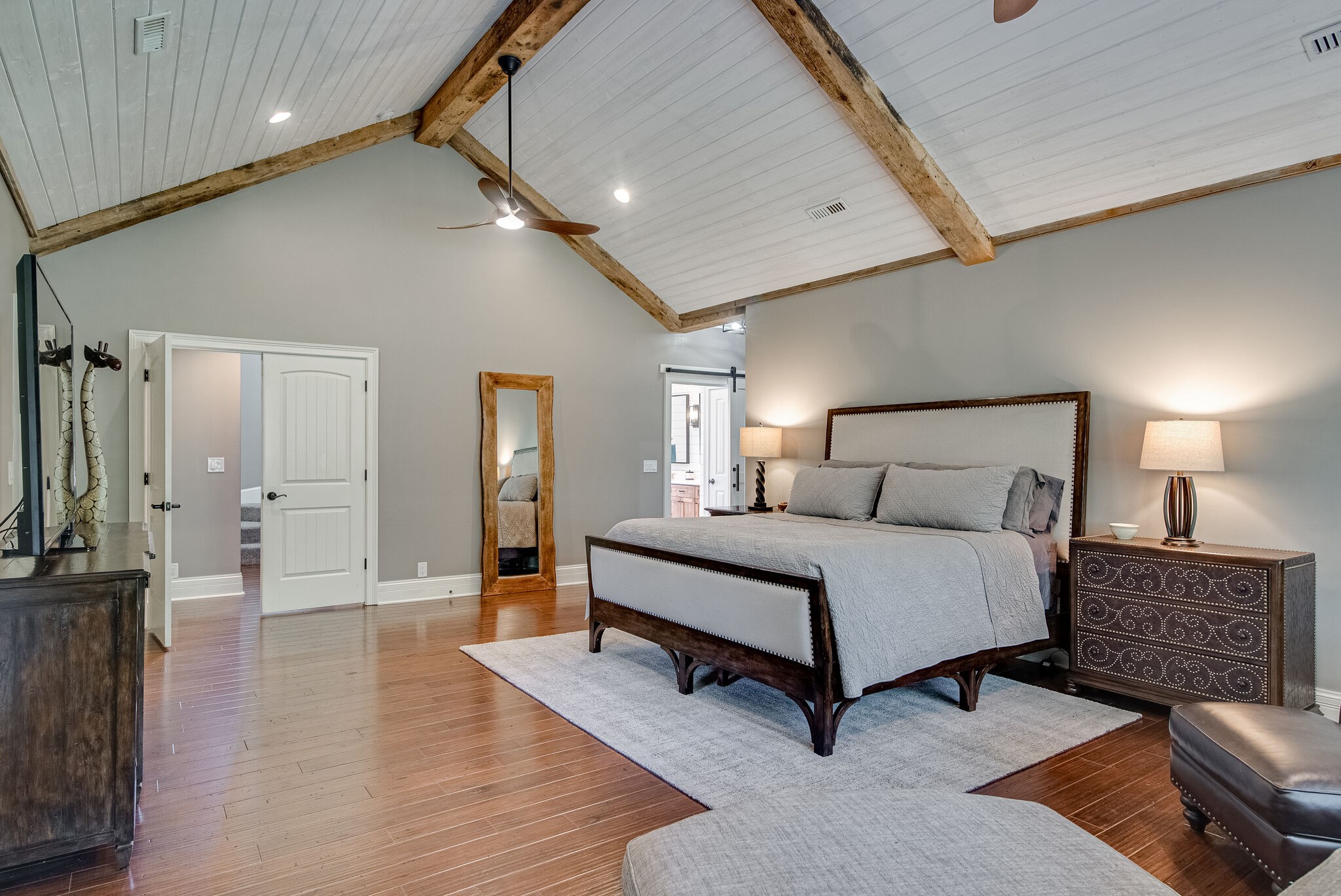 297 Vanderbilt Road Mount Juliet, TN 37122 - Photo 20 of 50 a spacious bedroom with a bed and a couch