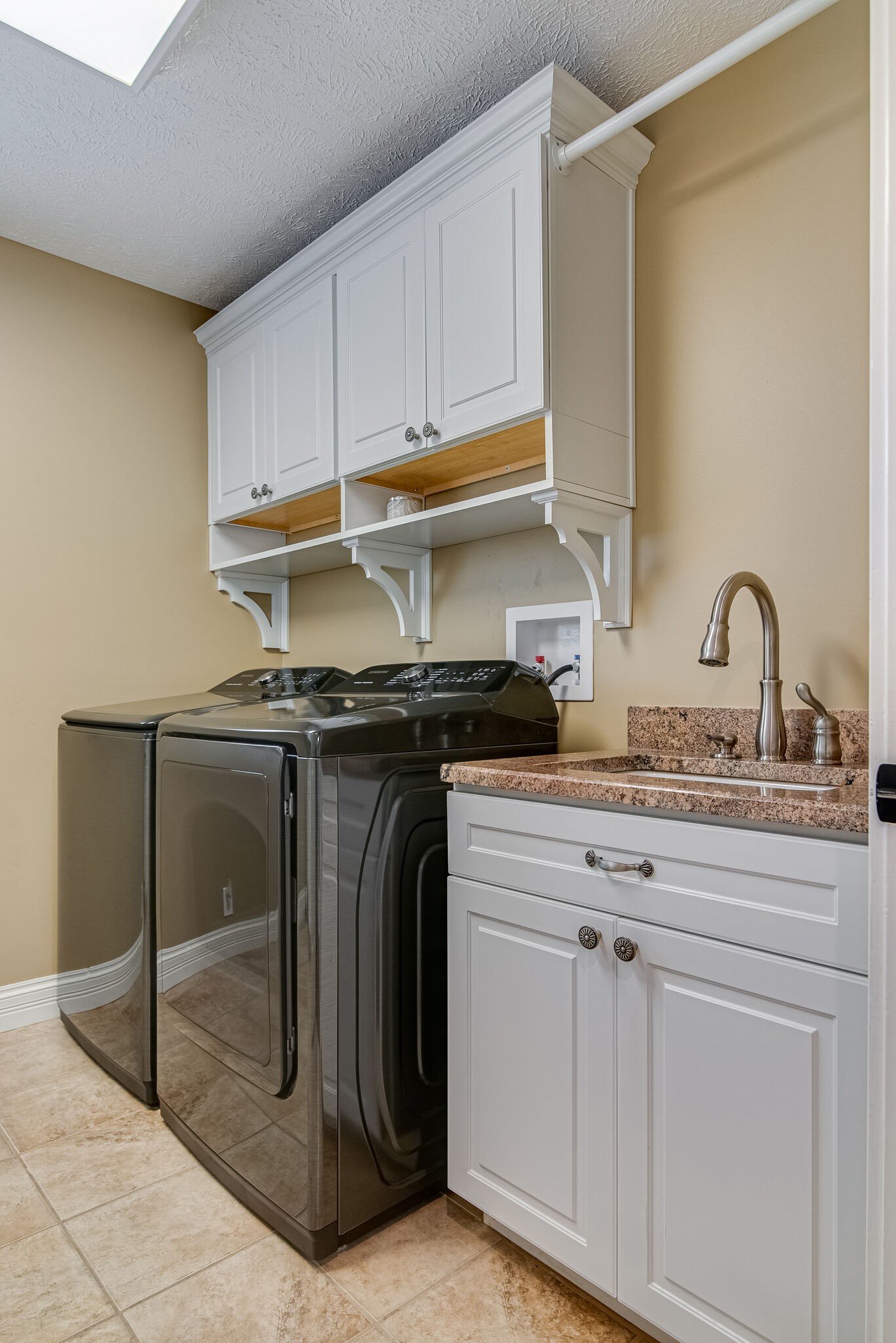 297 Vanderbilt Road Mount Juliet, TN 37122 - Photo 25 of 50 a kitchen with a sink and cabinets