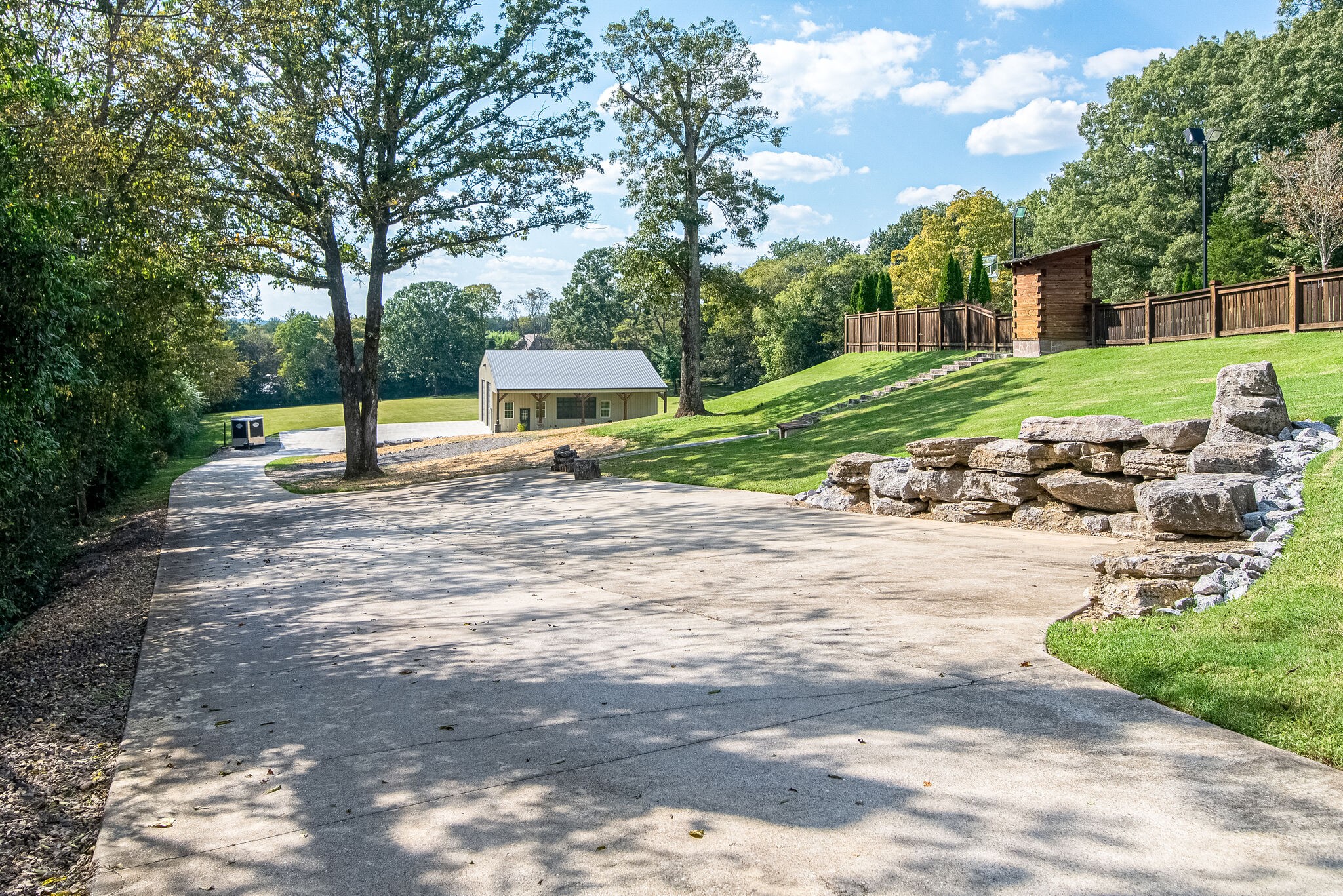 297 Vanderbilt Road Mount Juliet, TN 37122 - Photo 47 of 50 a view of a park with swings and slides