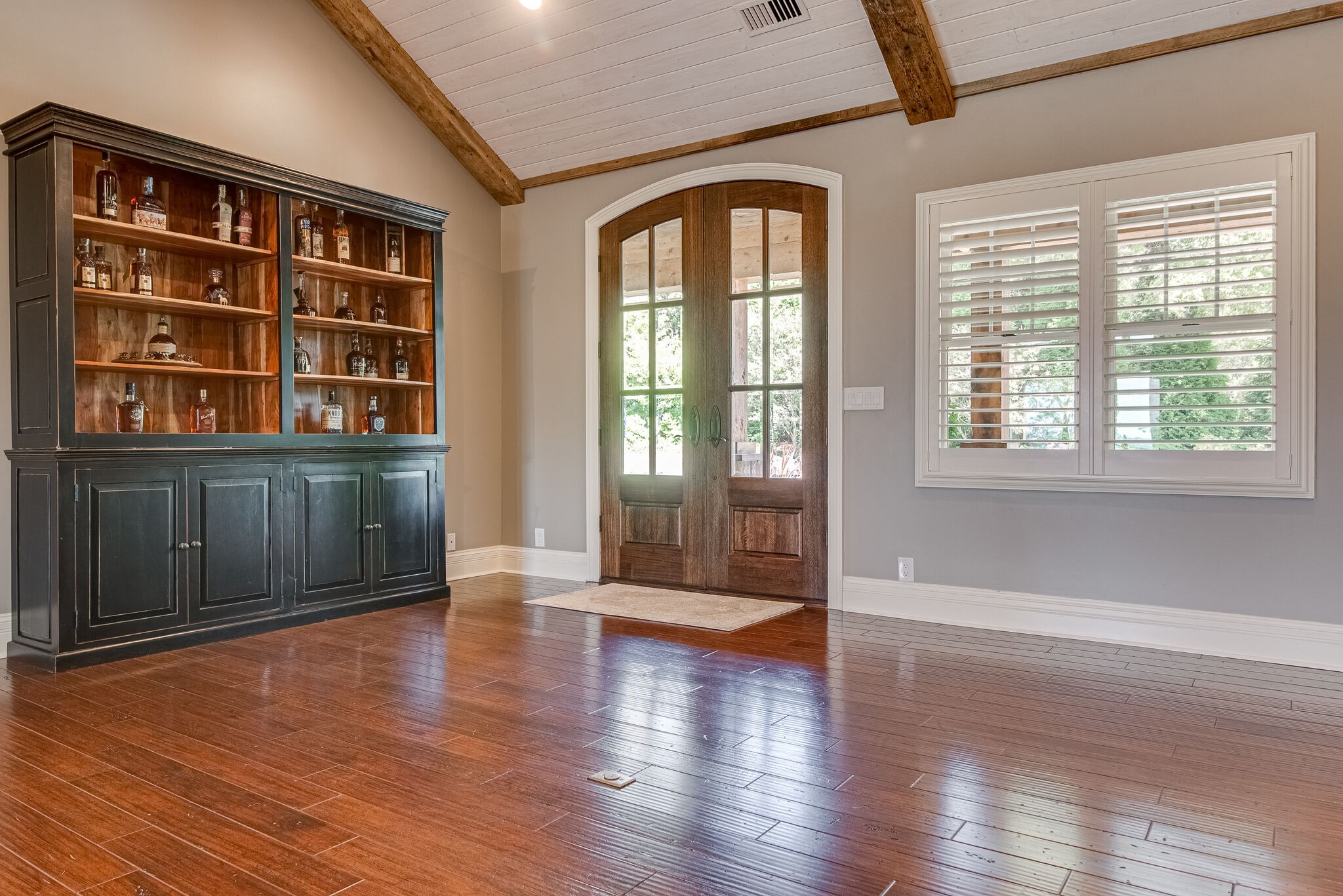297 Vanderbilt Road Mount Juliet, TN 37122 - Photo 8 of 50 a view of an empty room with wooden floor and balcony