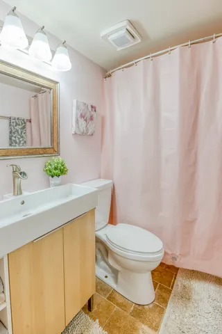 a bathroom with a sink and a toilet
