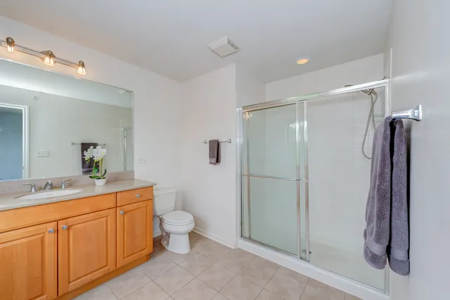 a bedroom with a workspace