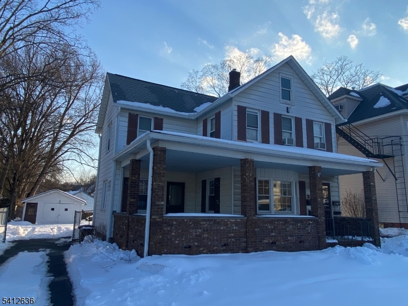 31 Kiel Avenue Butler, NJ 07405 - Photo 2 of 16 a view of a house with a yard