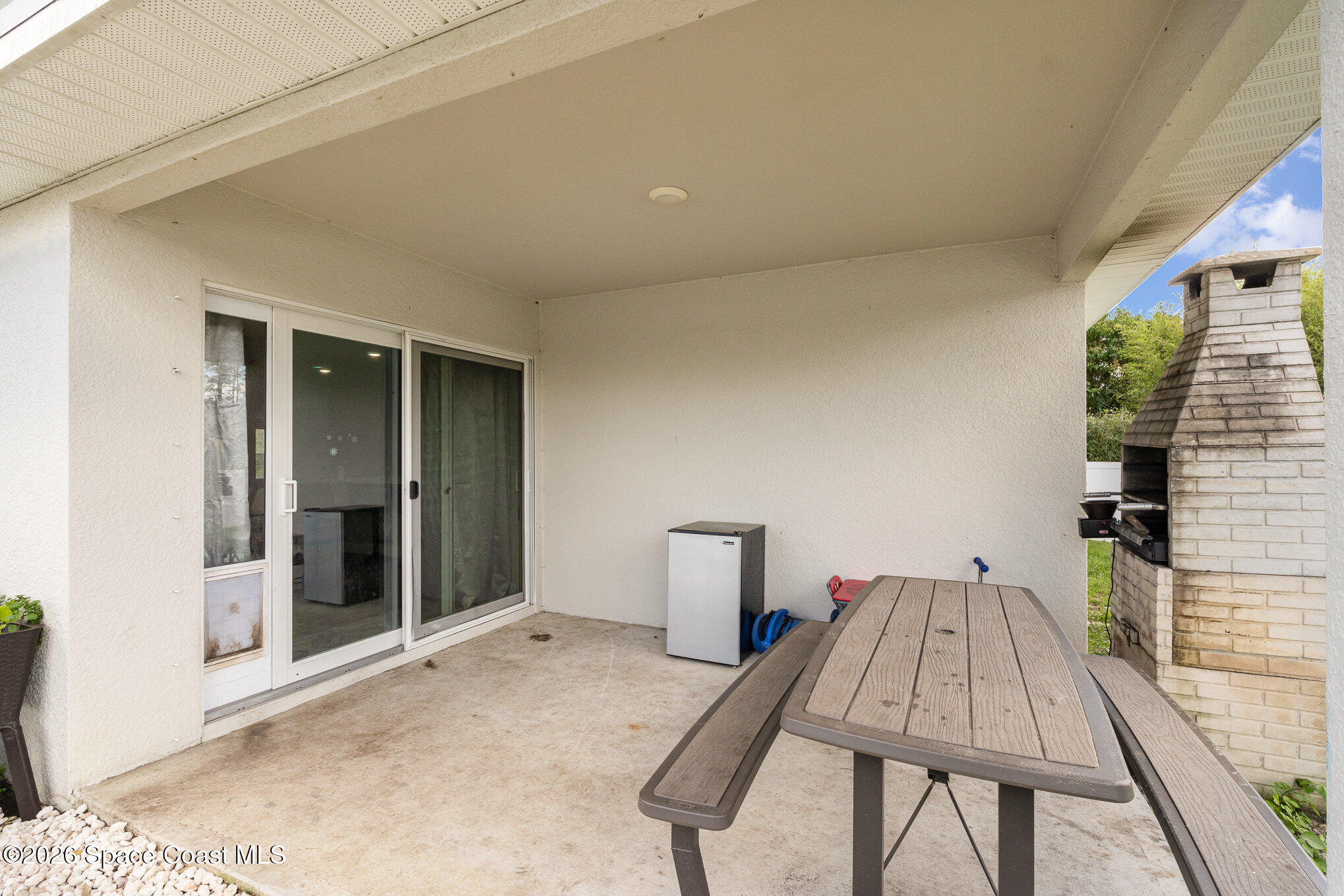 866 Carnival Road Southeast Palm Bay, FL 32909 - Photo 28 of 28 a bed room with a bed and a window