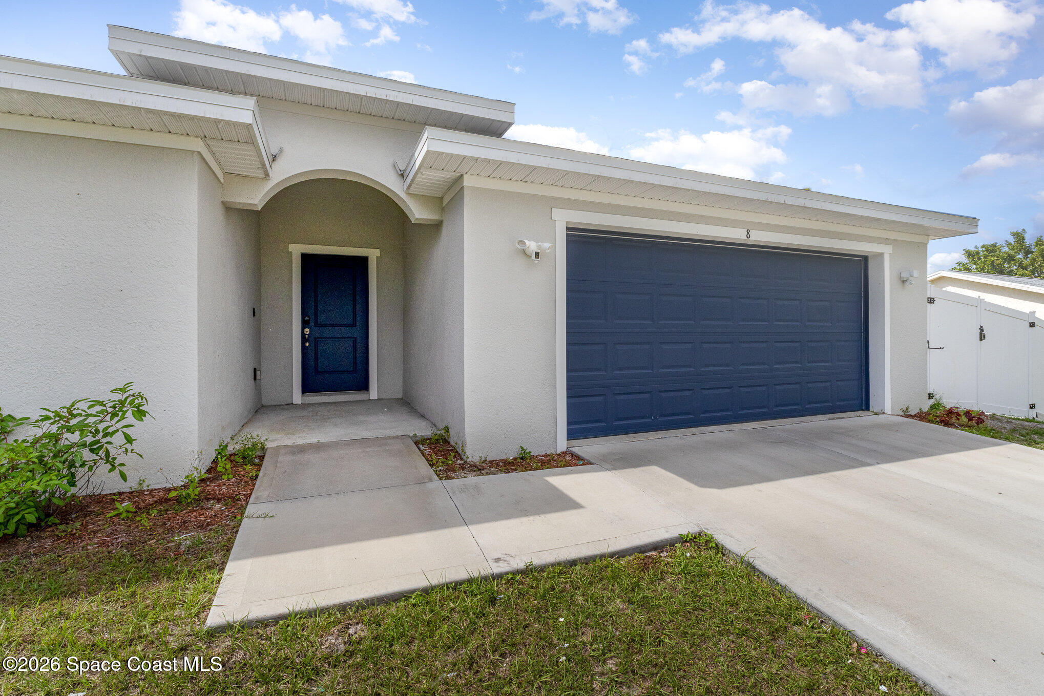 866 Carnival Road Southeast Palm Bay, FL 32909 - Photo 5 of 28 a front view of a house