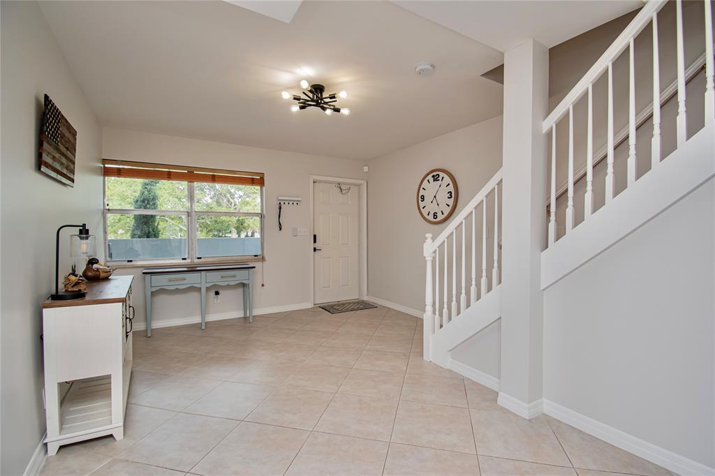 9500 Southwest 3rd Street, Unit 248 Boca Raton, FL 33428 - Photo 16 of 47 a view of an entryway with furniture
