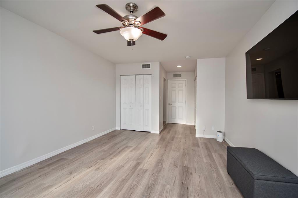 9500 Southwest 3rd Street, Unit 248 Boca Raton, FL 33428 - Photo 24 of 47 wooden floor in an empty room with a window