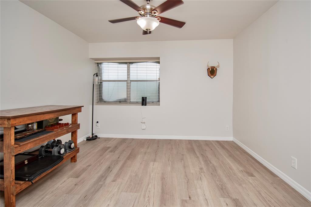 9500 Southwest 3rd Street, Unit 248 Boca Raton, FL 33428 - Photo 27 of 47 wooden floor in an empty room with a window