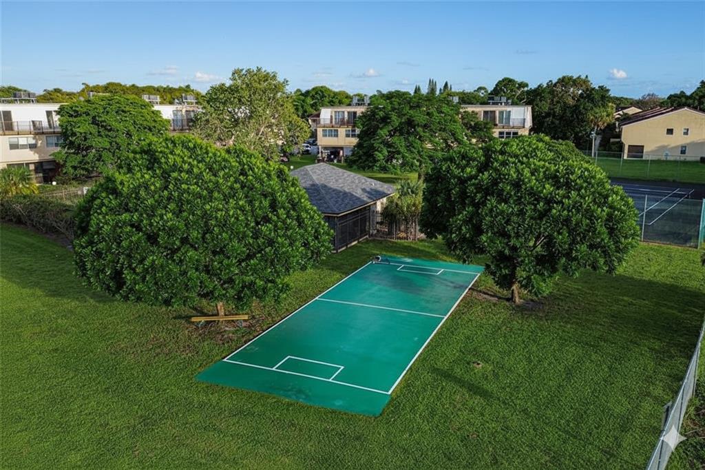 9500 Southwest 3rd Street, Unit 248 Boca Raton, FL 33428 - Photo 39 of 47 a view of a tennis court