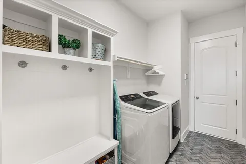 a spacious bathroom with a bathtub and shower