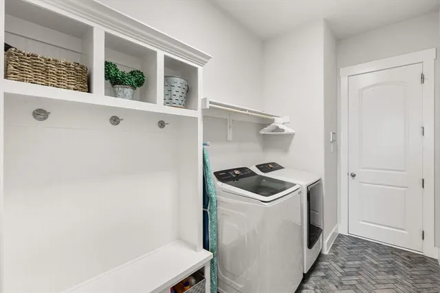 a spacious bathroom with a bathtub and shower