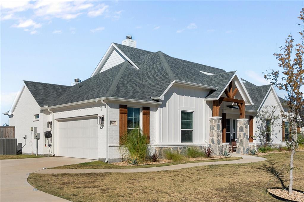 8221 David Lane Midlothian, TX 76065 - Photo 31 of 34 a front view of a house with garden