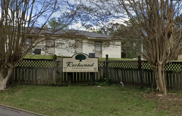 a view of a deck and a yard