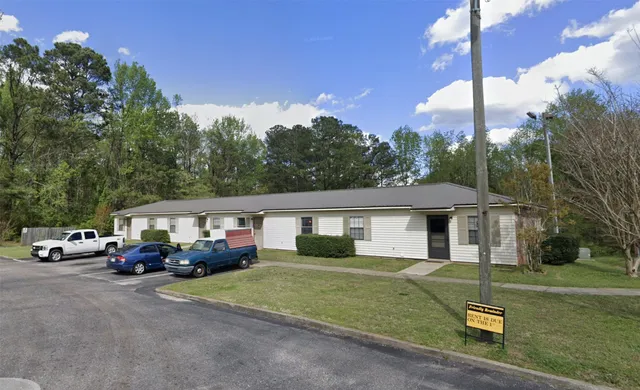 a car parked in front of a house