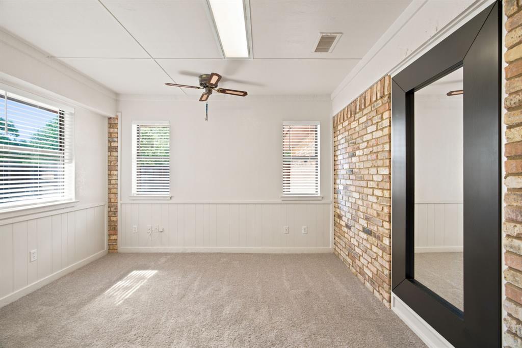 305 Bent Oak Road Weatherford, TX 76086 - Photo 26 of 35 11x11 bedroom with exterior entrance to patio