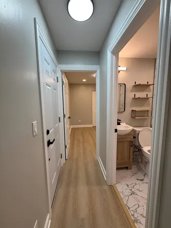 a bathroom with a sink and toilet