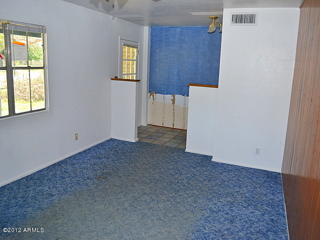 2888 East Redfield Road Gilbert, AZ 85234 - Photo 40 of 43 023-367338-living-room-1
