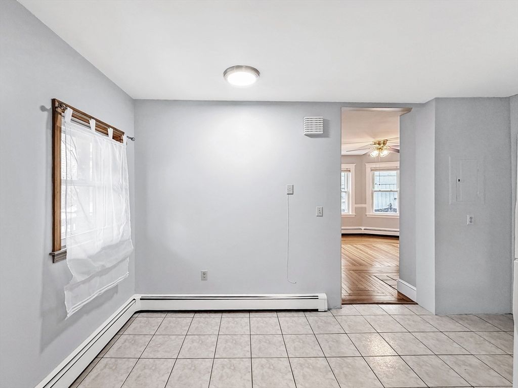 19 Moore Street Winthrop, MA 02152 - Photo 18 of 42 a view of an empty room and window