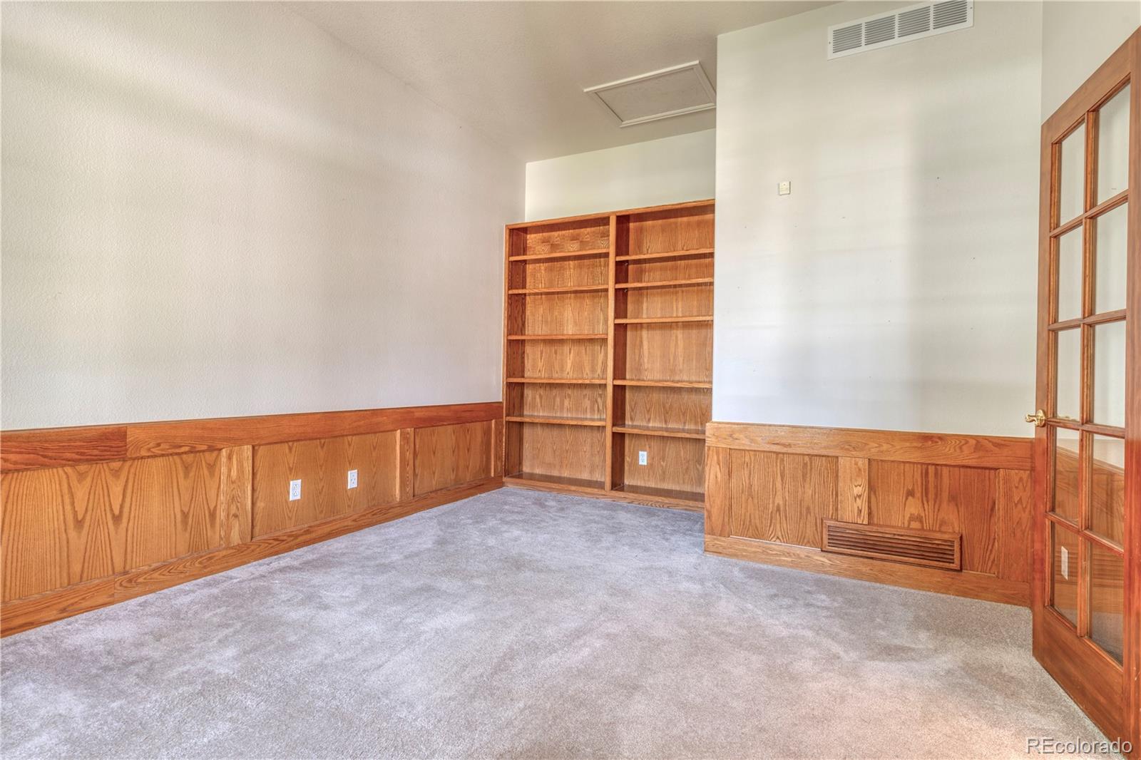3756 West 100th Avenue Westminster, CO 80031 - Photo 15 of 45 an empty room with cabinet