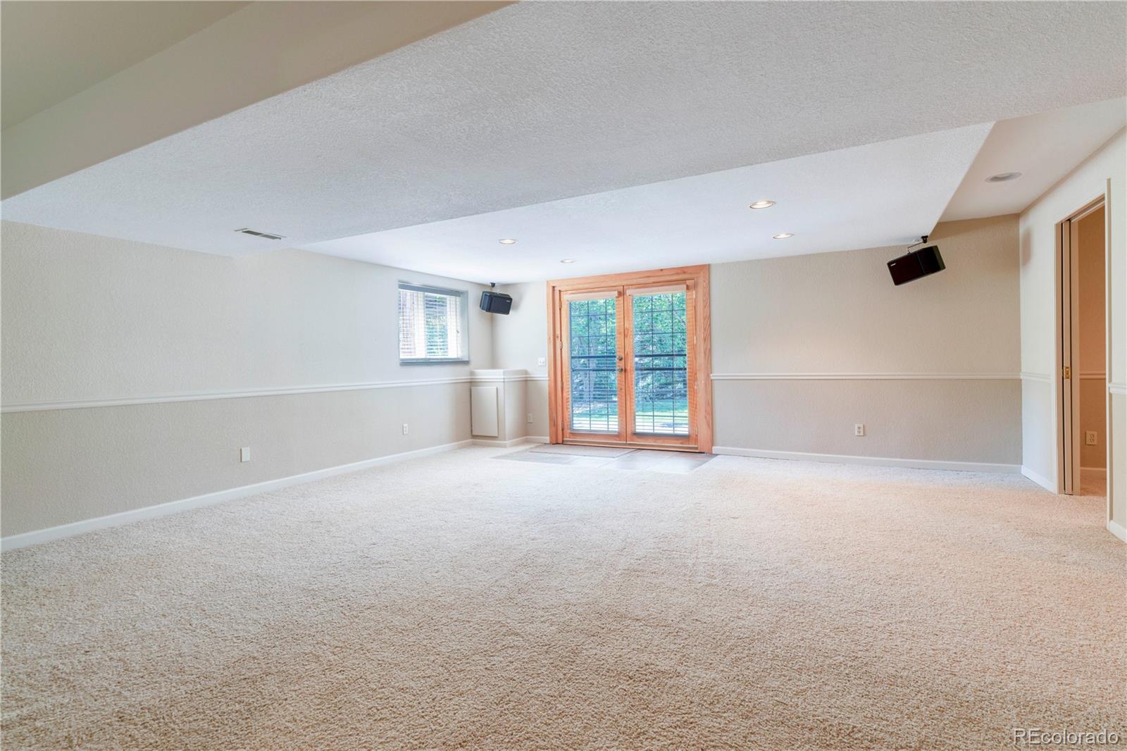 3756 West 100th Avenue Westminster, CO 80031 - Photo 27 of 45 a view of an empty room with a window