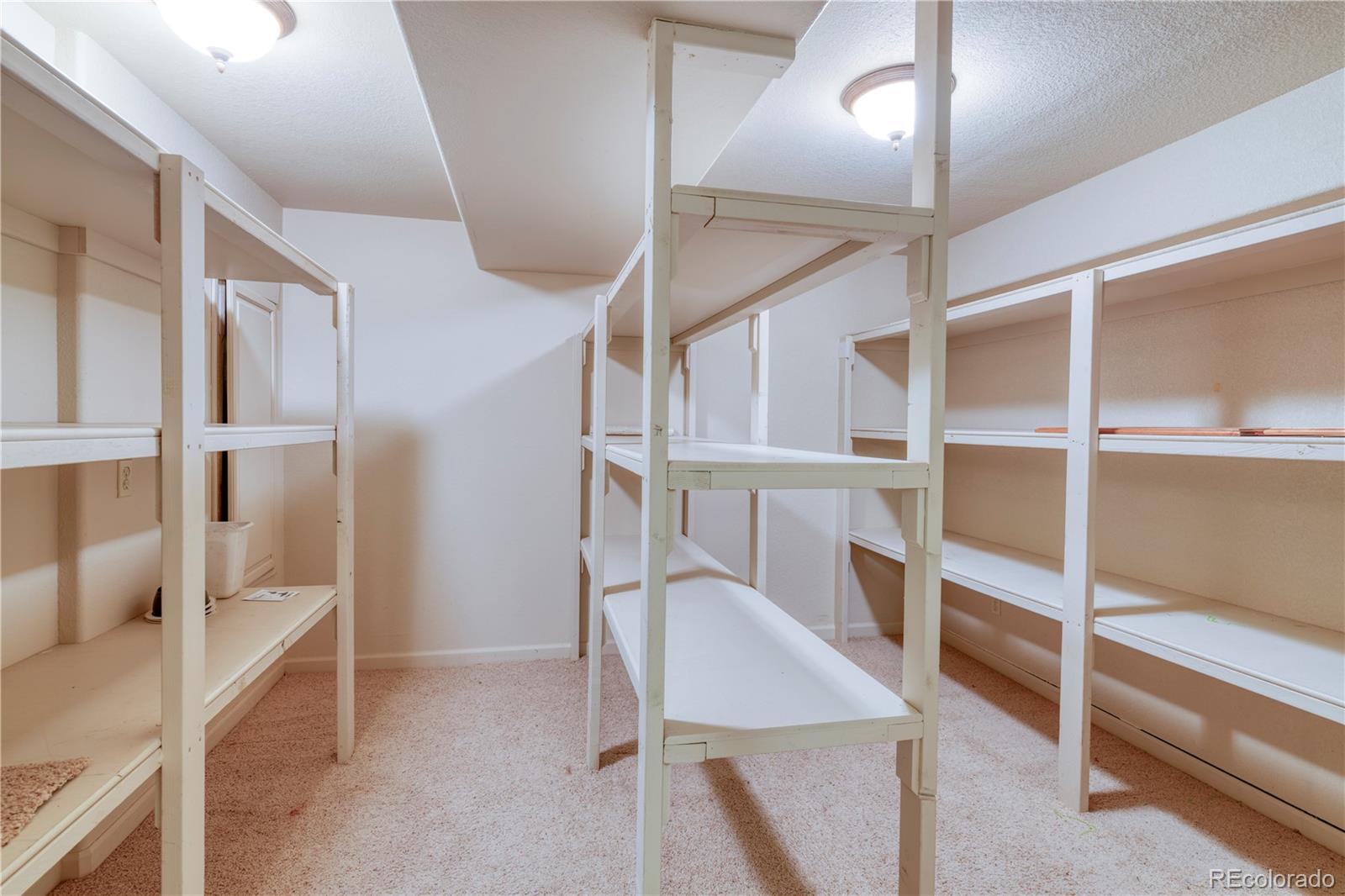 3756 West 100th Avenue Westminster, CO 80031 - Photo 34 of 45 a view of a hallway with seating area