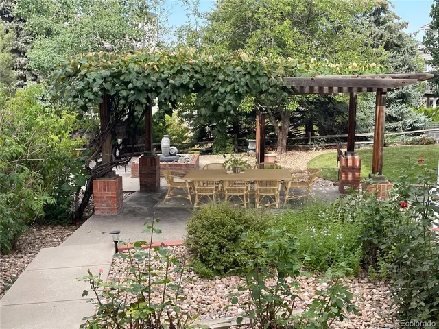 a view of a swimming pool with a patio