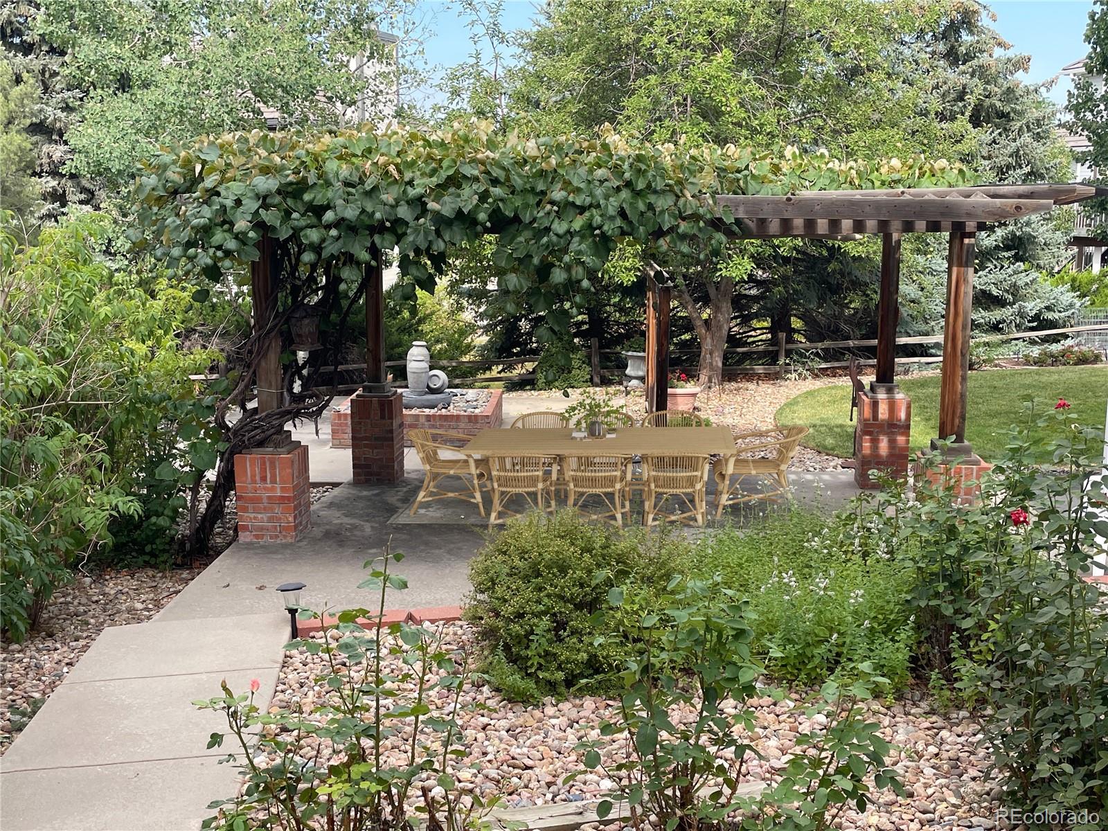 3756 West 100th Avenue Westminster, CO 80031 - Photo 39 of 45 a view of a swimming pool with a patio