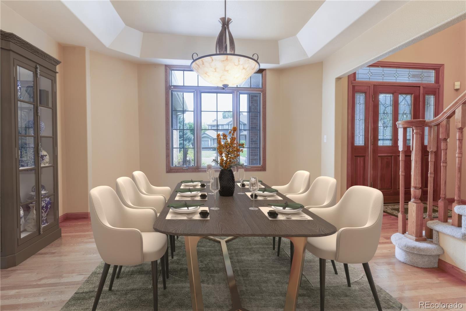 3756 West 100th Avenue Westminster, CO 80031 - Photo 7 of 45 a view of a dining room with furniture window and outside view
