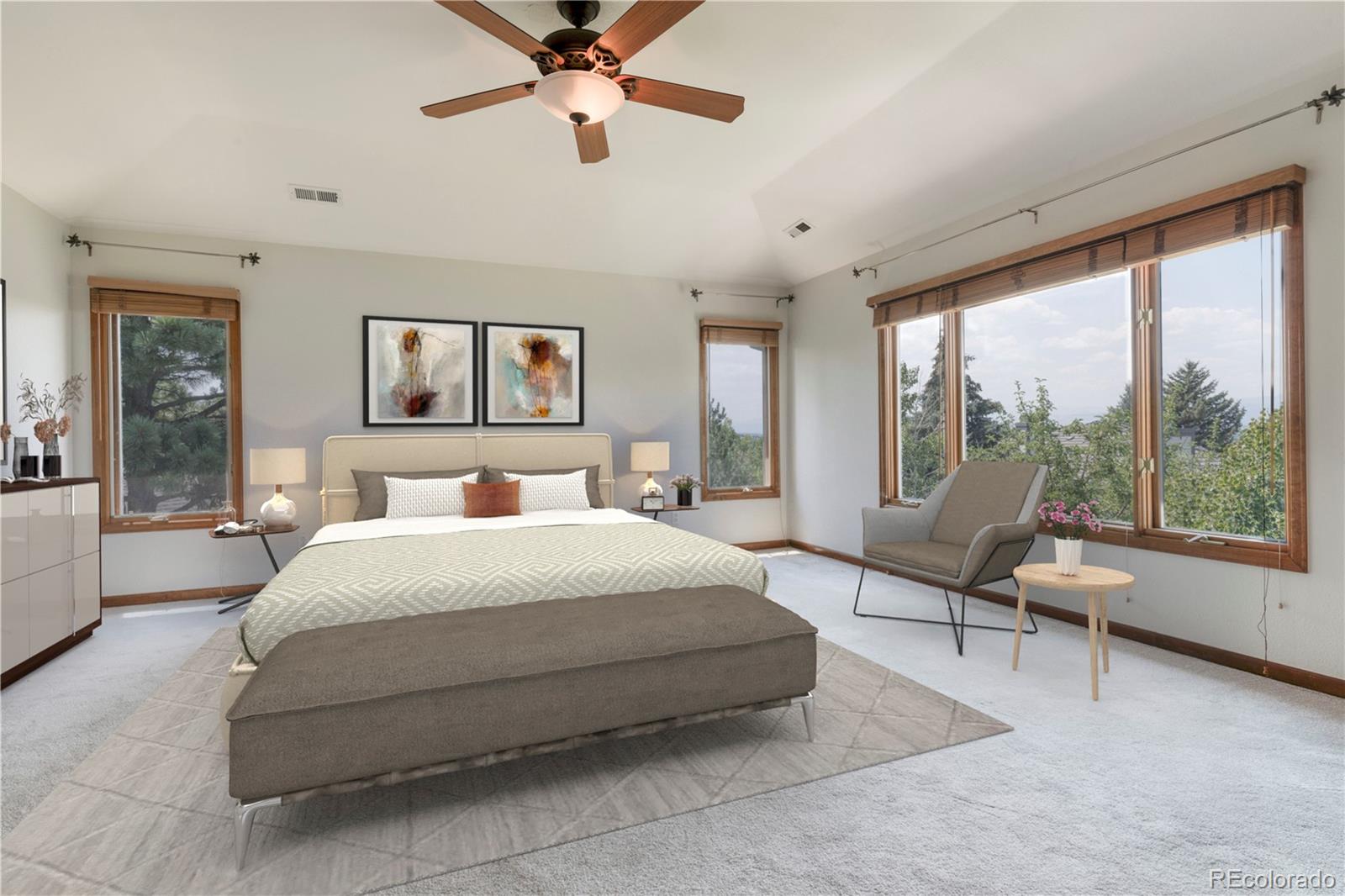 3756 West 100th Avenue Westminster, CO 80031 - Photo 9 of 45 a spacious bedroom with a bed and large window