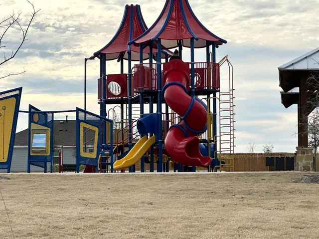 an outdoor space with furniture