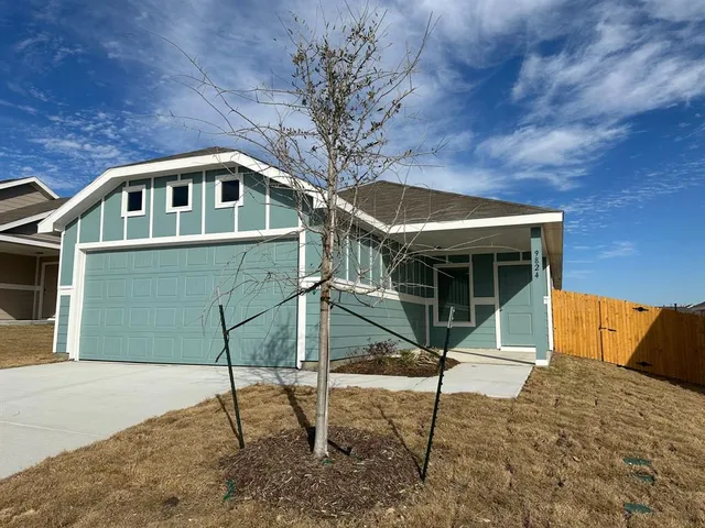 a house with trees in front of it