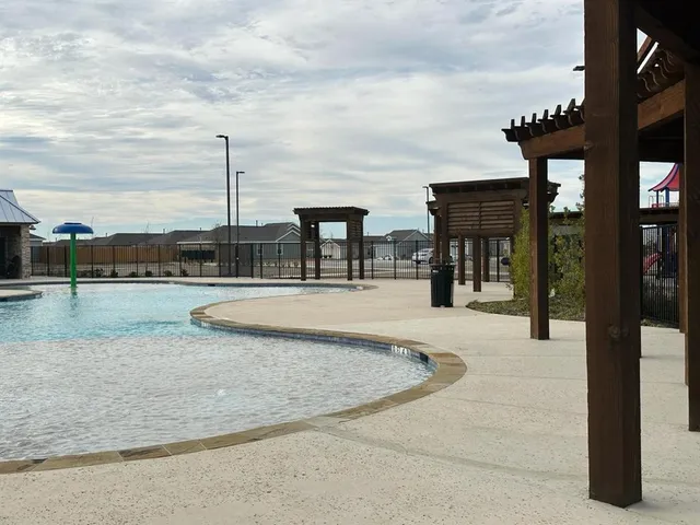 a view of a lake with a house