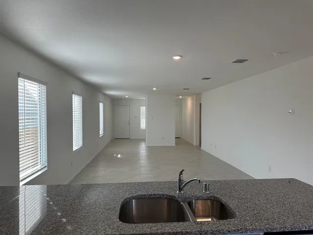 a kitchen with a sink and dishwasher