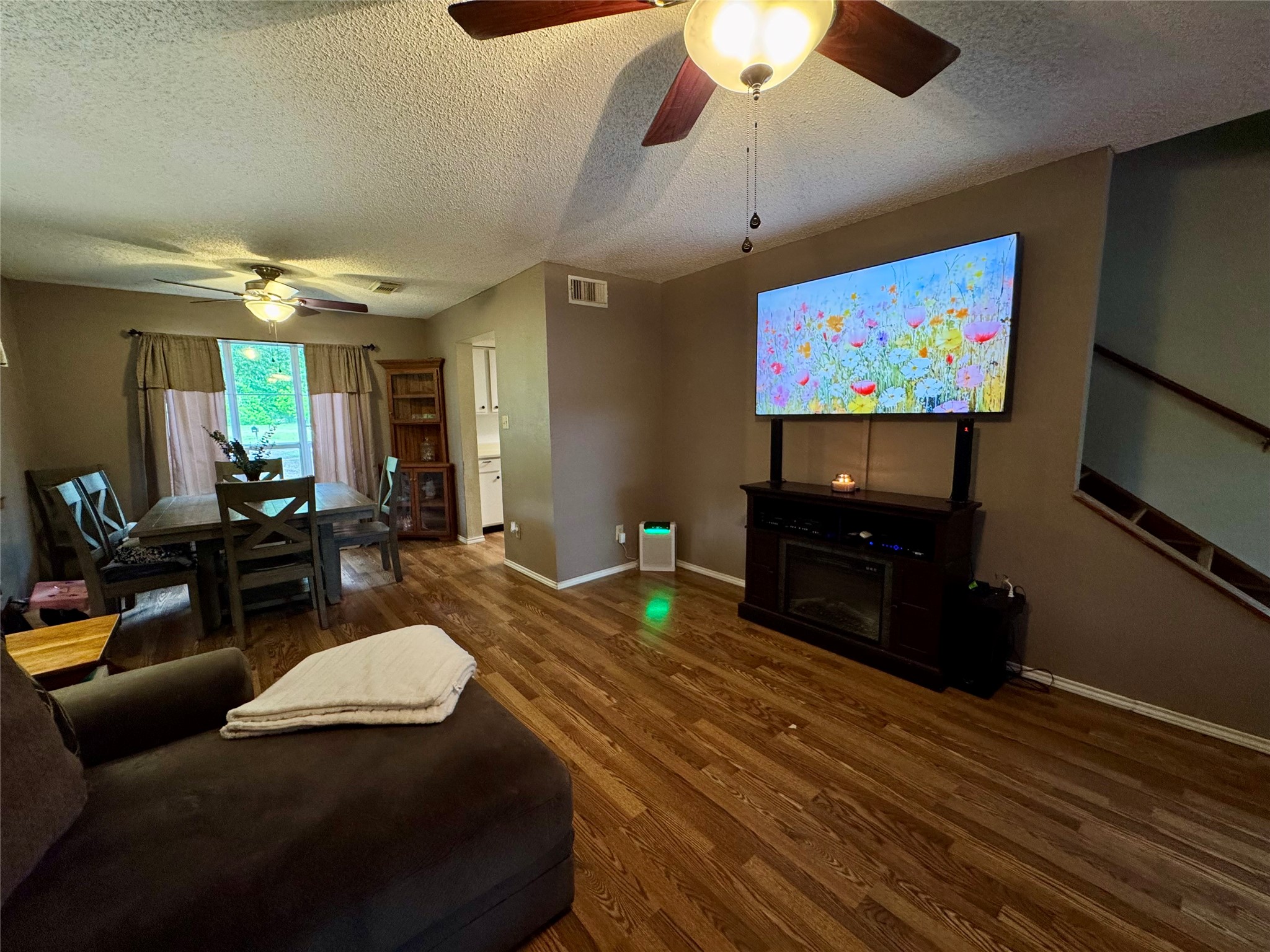954 Hillbilly Heaven Road Livingston, TX 77351 - Photo 14 of 37 a living room with furniture and a flat screen tv