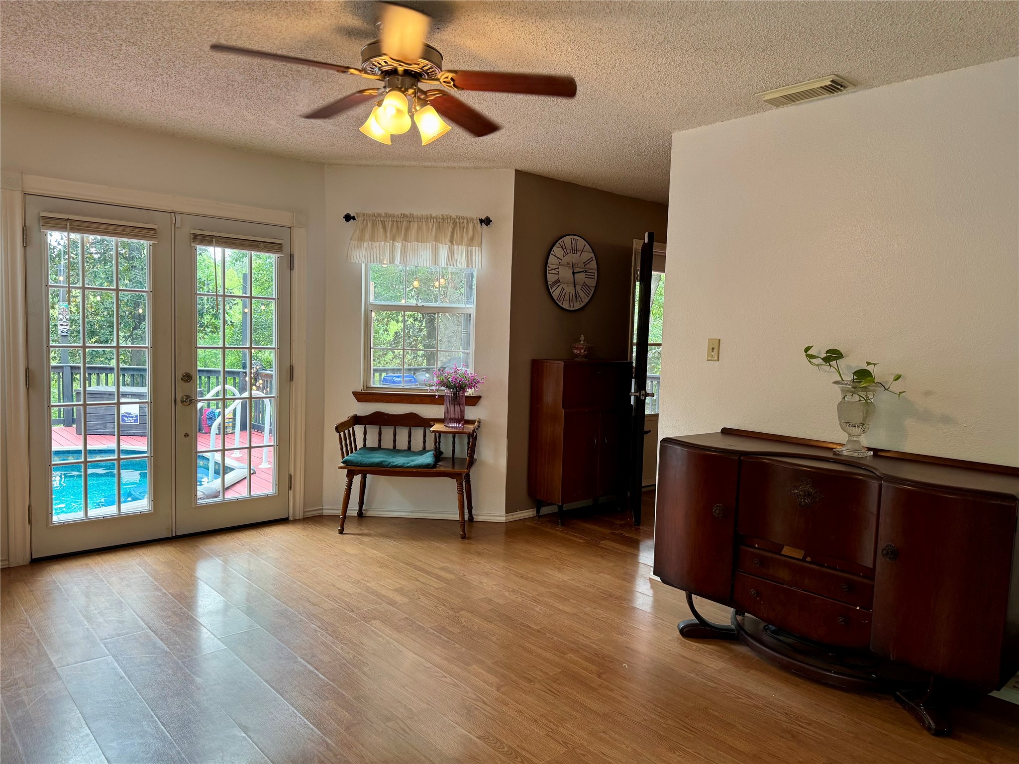954 Hillbilly Heaven Road Livingston, TX 77351 - Photo 23 of 37 a view of a livingroom with furniture and a ceiling fan