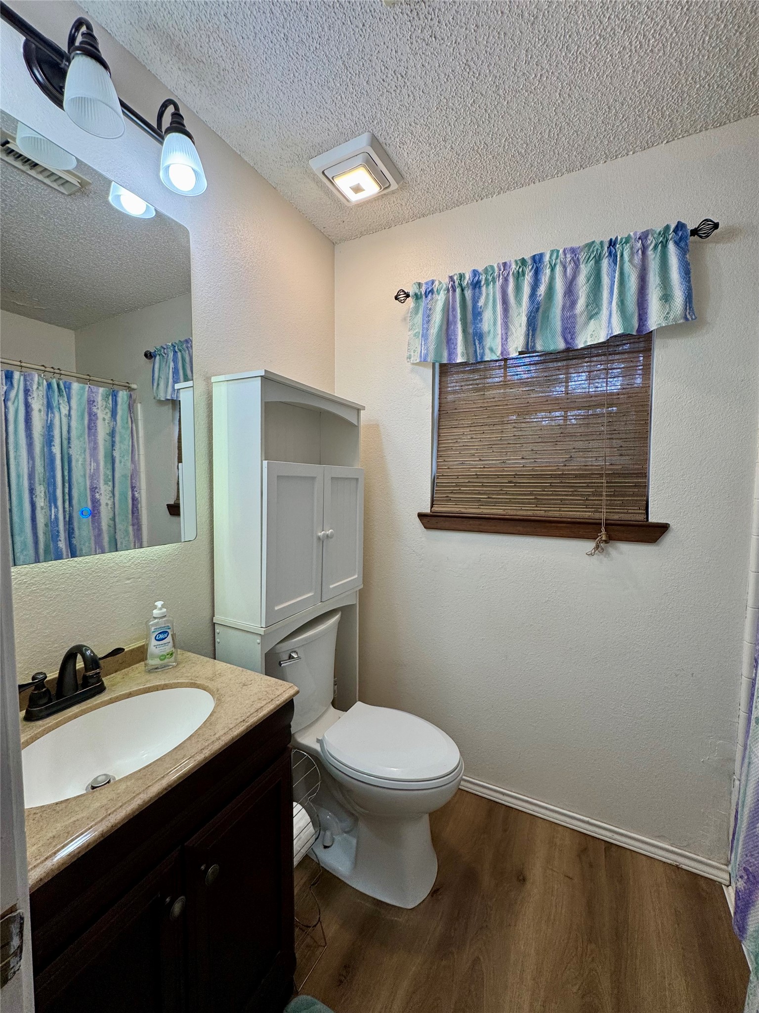 954 Hillbilly Heaven Road Livingston, TX 77351 - Photo 30 of 37 a bathroom with a sink and a mirror
